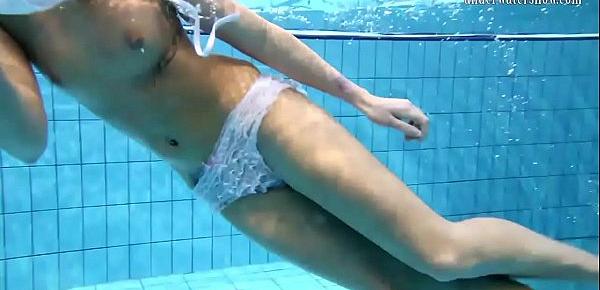  Sexy blonde Monica gets horny in the pool